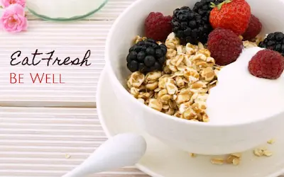 A bowl of muesli with fresh berries